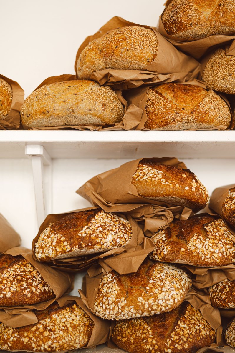 Freshly baked artisan bread loaves and buns