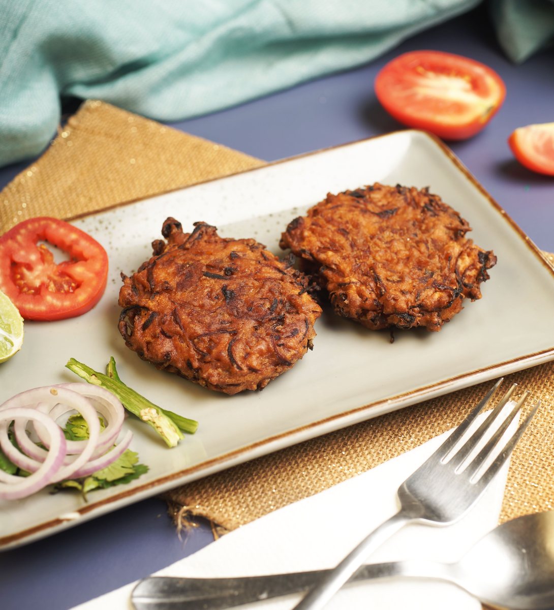 Crispy breaded chicken pieces and vegetables