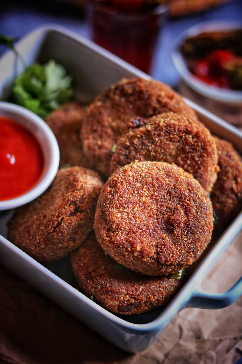 Ready-to-eat aloo tikki and cutlets on parchment
