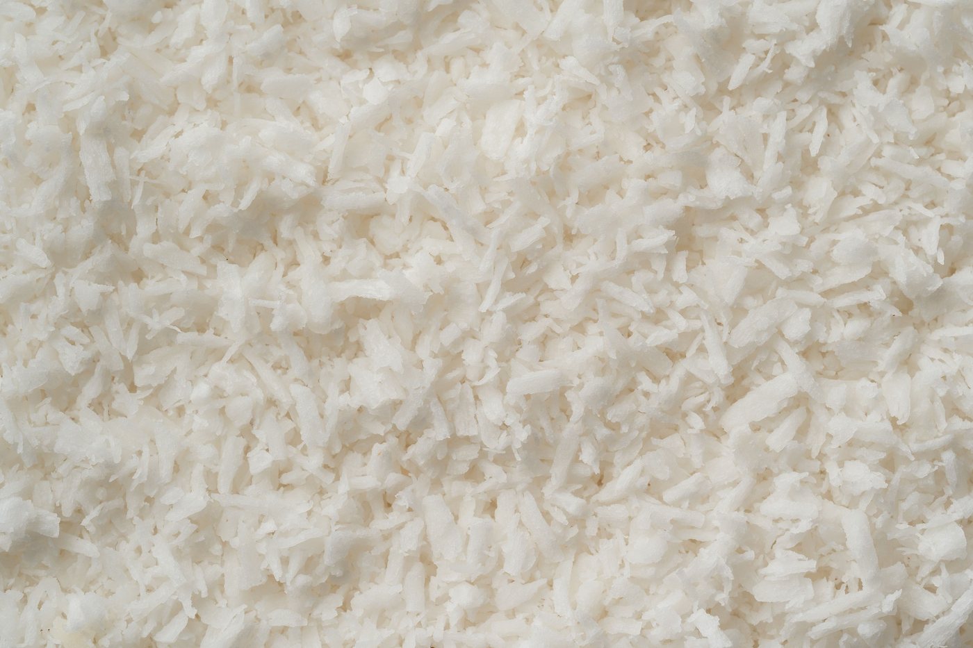 Extreme close-up of creamish white dehydrated potato flakes